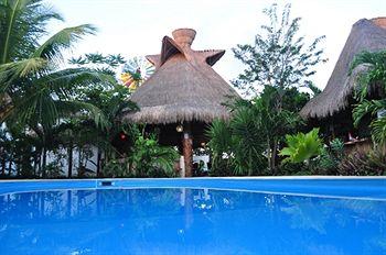 Hotel Green Tulum Calle Coba esquina Puerto Morelos SM 37, Lote4